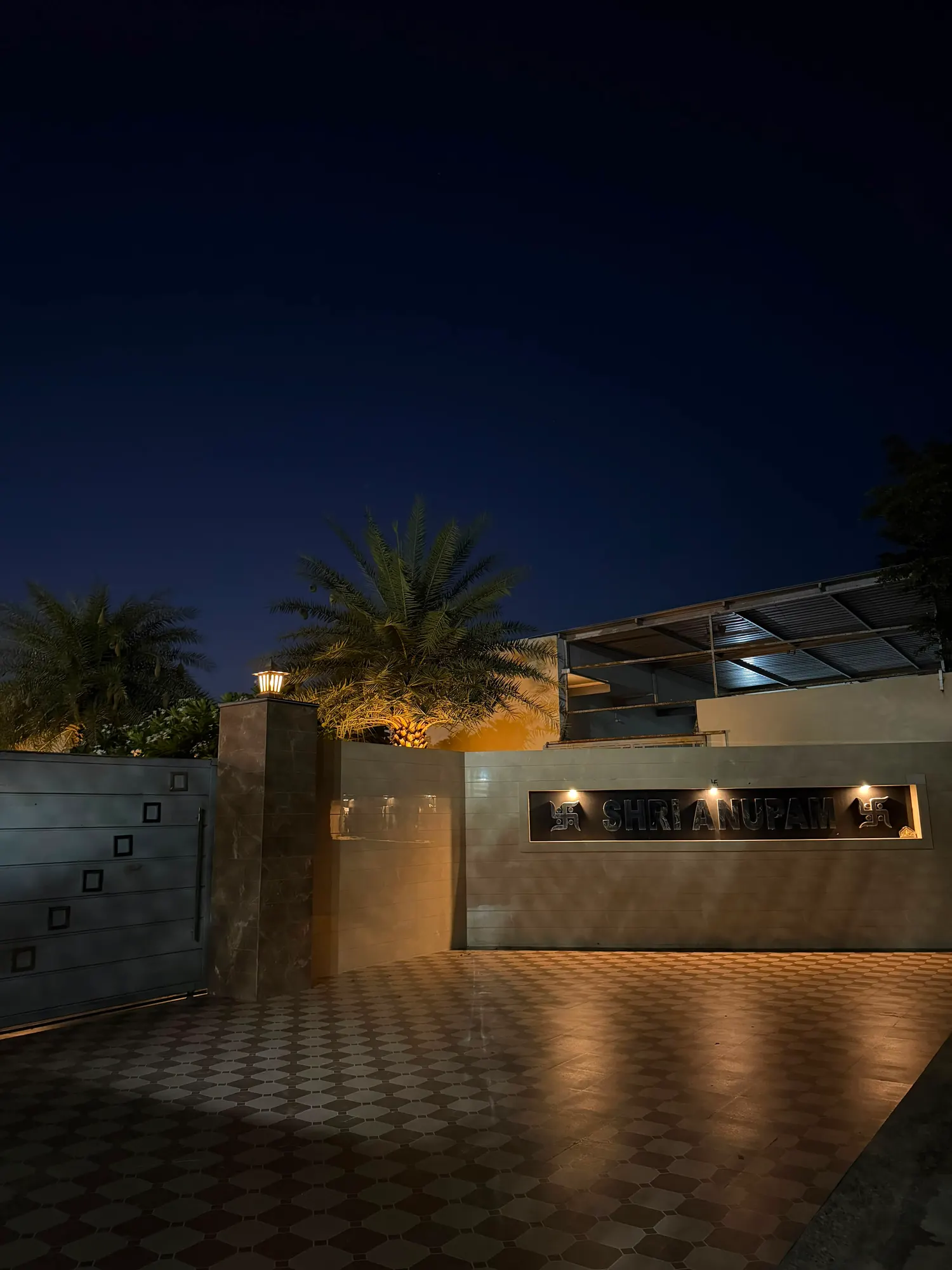 The entrance gate at night